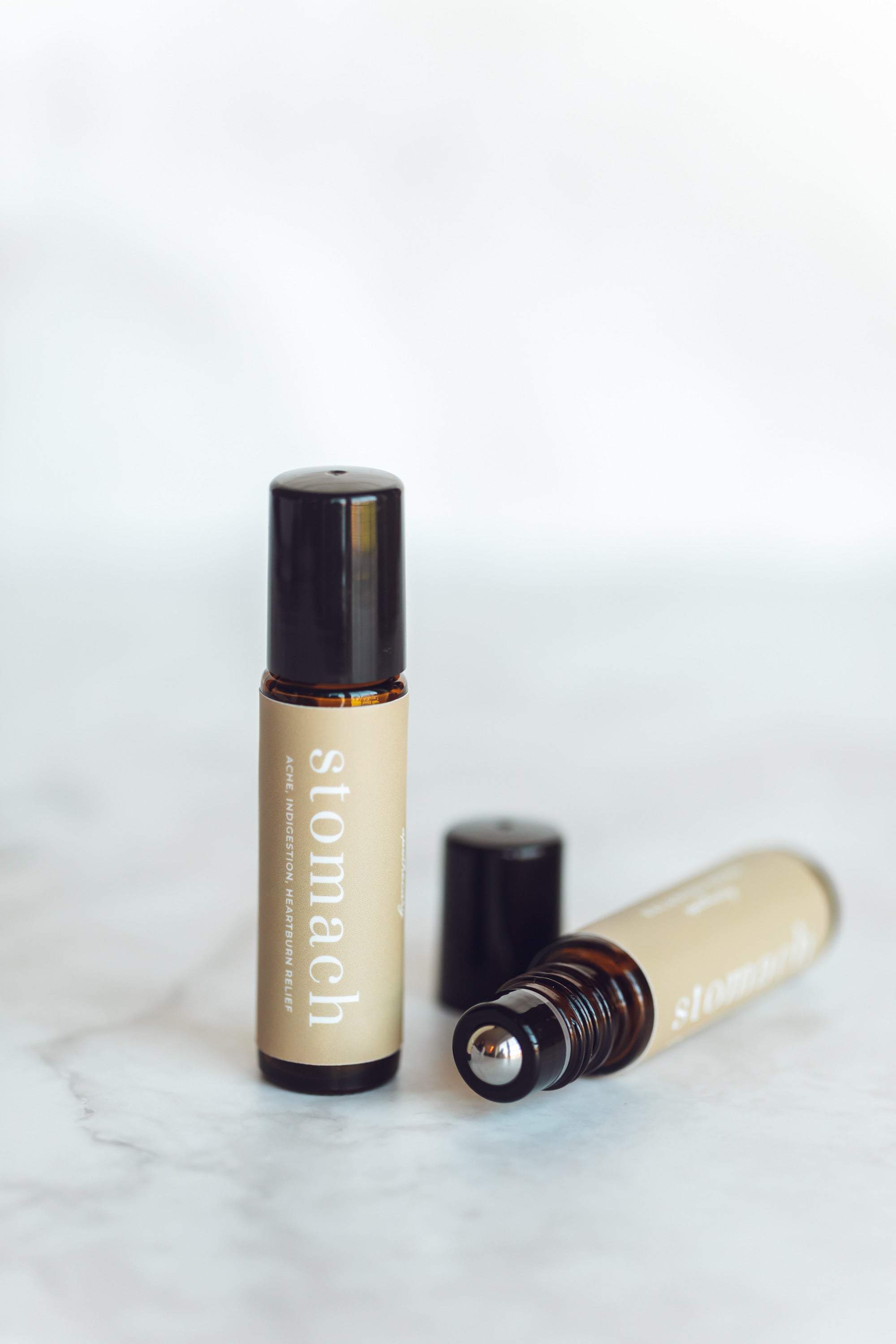 stomach essential oil rollerball blend labeled stomach