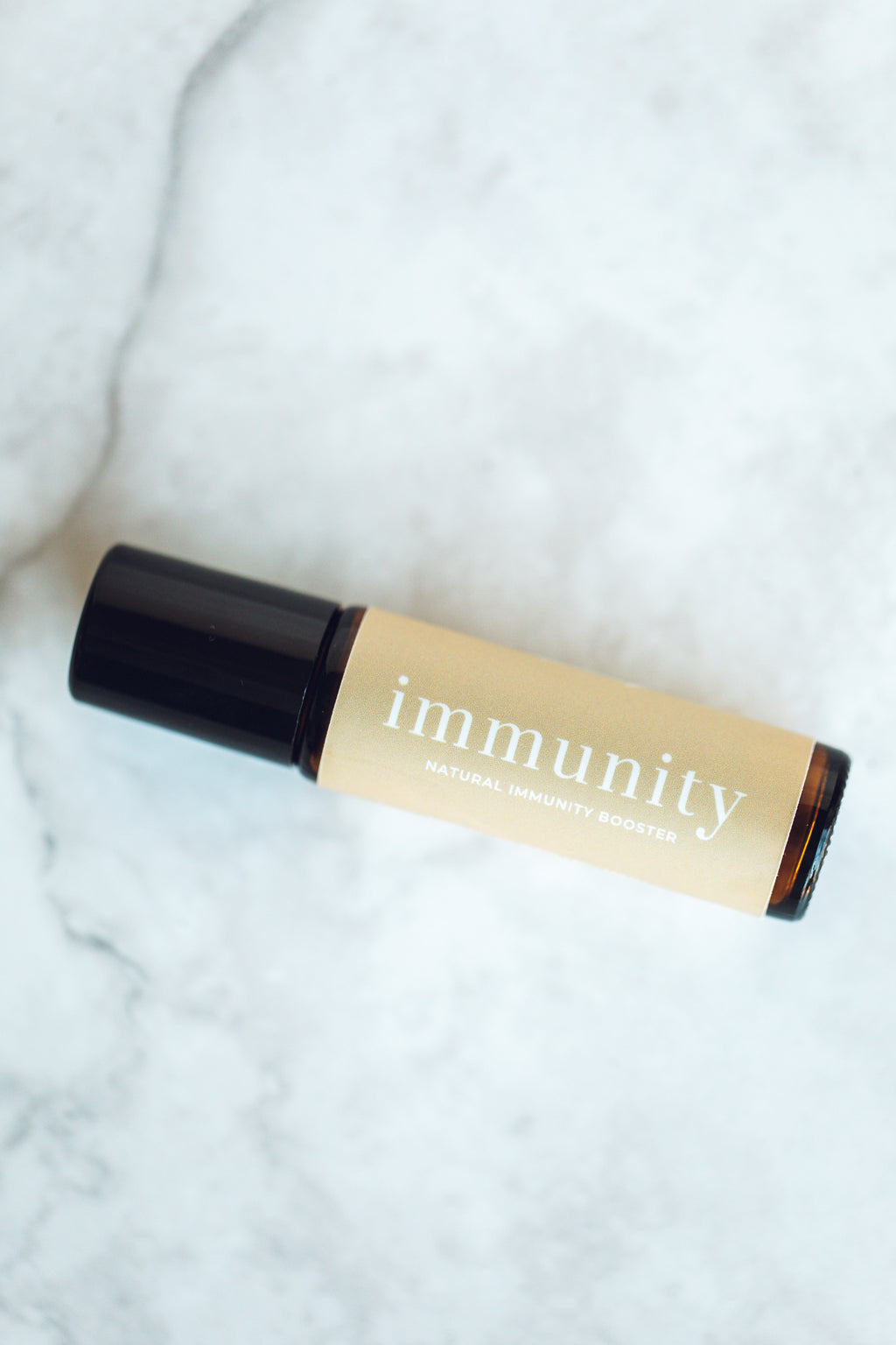 immunity boosting essential oil rollerball, labeled immunity