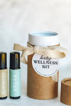Baby wellness kit with essential oil bottles on a white background